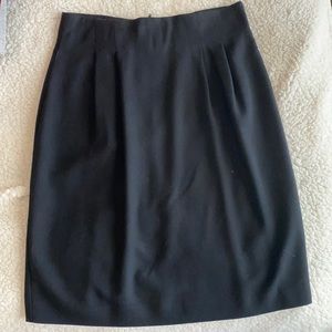Just above the knee. Black skirt, goes great with any wardrobe.